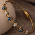 Evil Eye Gold Plated Bracelet for Women | Anti-Tarnish Stainless Steel Kada with Crystal Charms| Anyaura