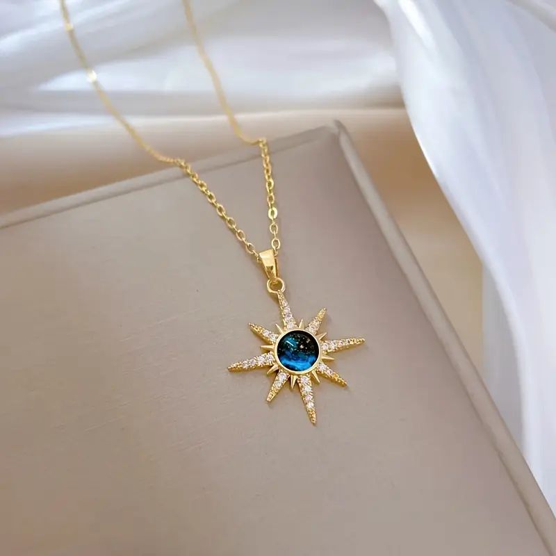 Gold Plated Starburst Pendant Necklace with Blue Crystal| Anyaura